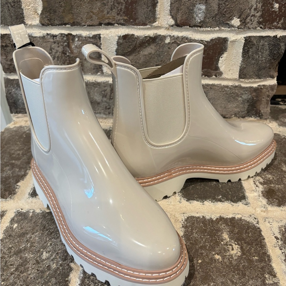 Brand NEW!! Never worn!! With tags and box
Dolce Vita Stormy H2O boots 
Size 8
